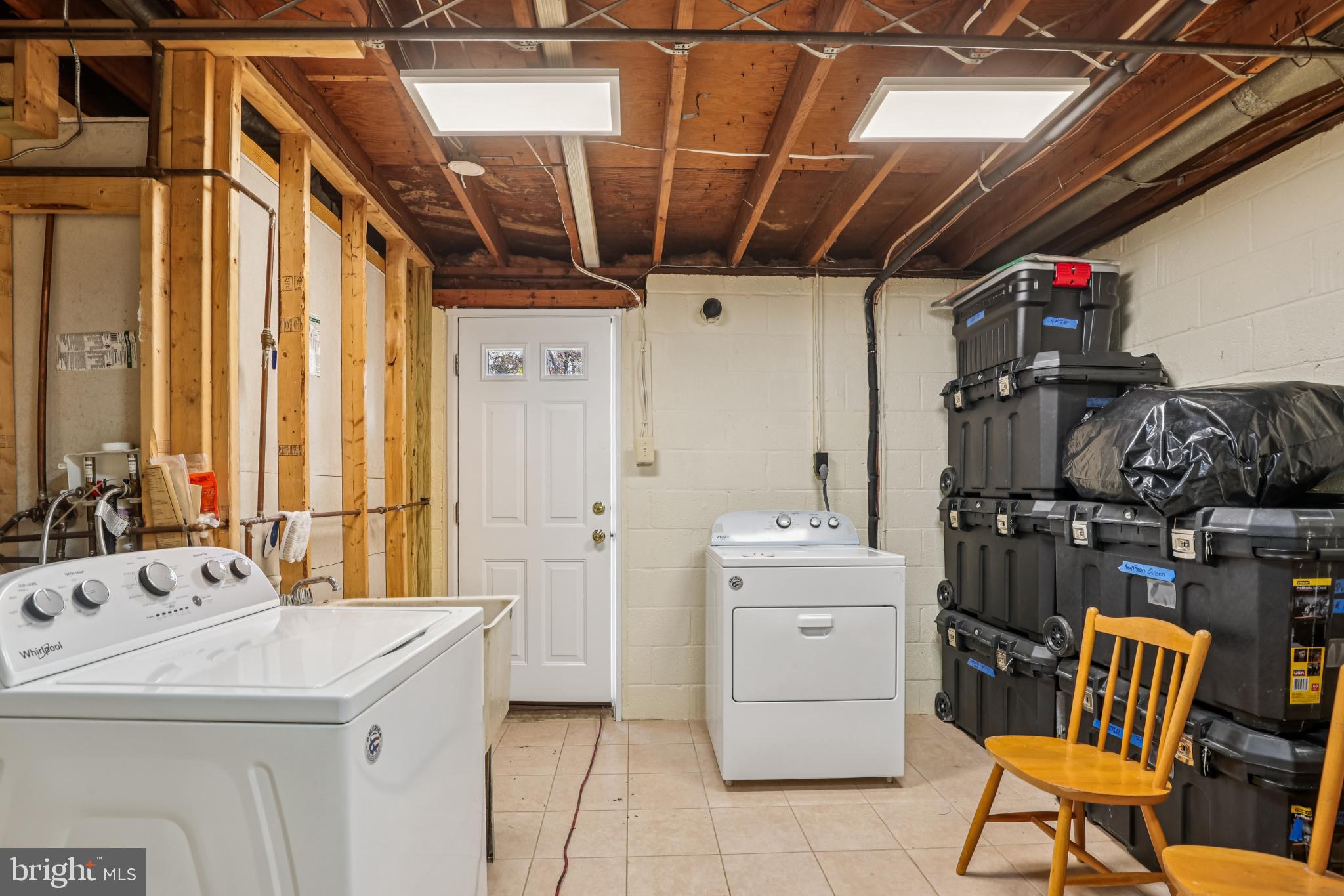 617 Denham Road Rockville, MD 20851 - Photo 26 of 31 Functional laundry space with ample storage.