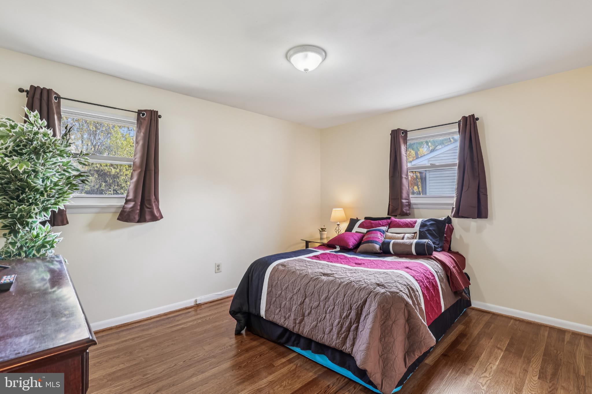 617 Denham Road Rockville, MD 20851 - Photo 10 of 31 Light main bedroom with natural light and warmth.