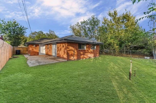 a view of a backyard with a garden