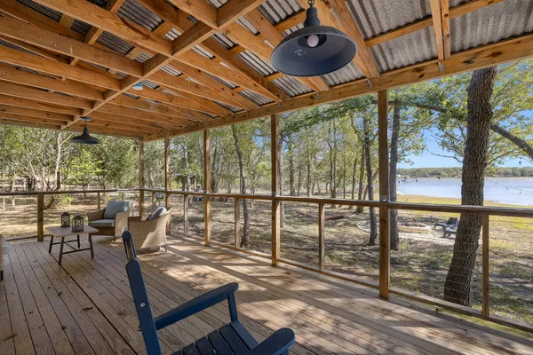 a outdoor space with patio lots of furniture and wooden floors