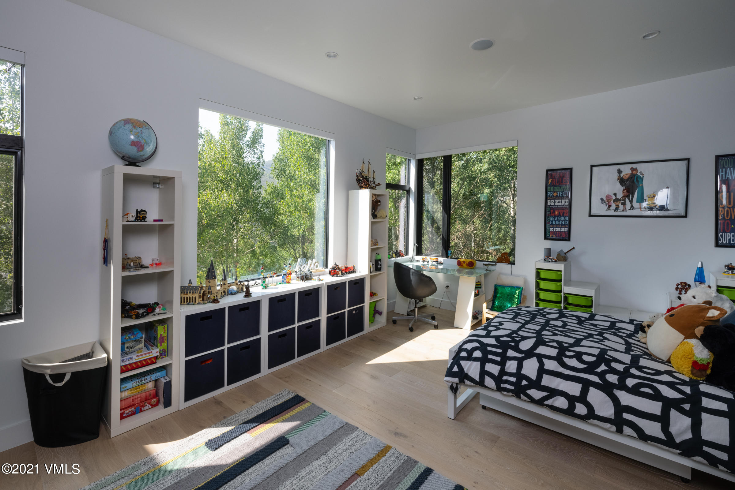 4380 June Point Avon, CO 81620 - Photo 22 of 39 a bedroom with furniture and a window