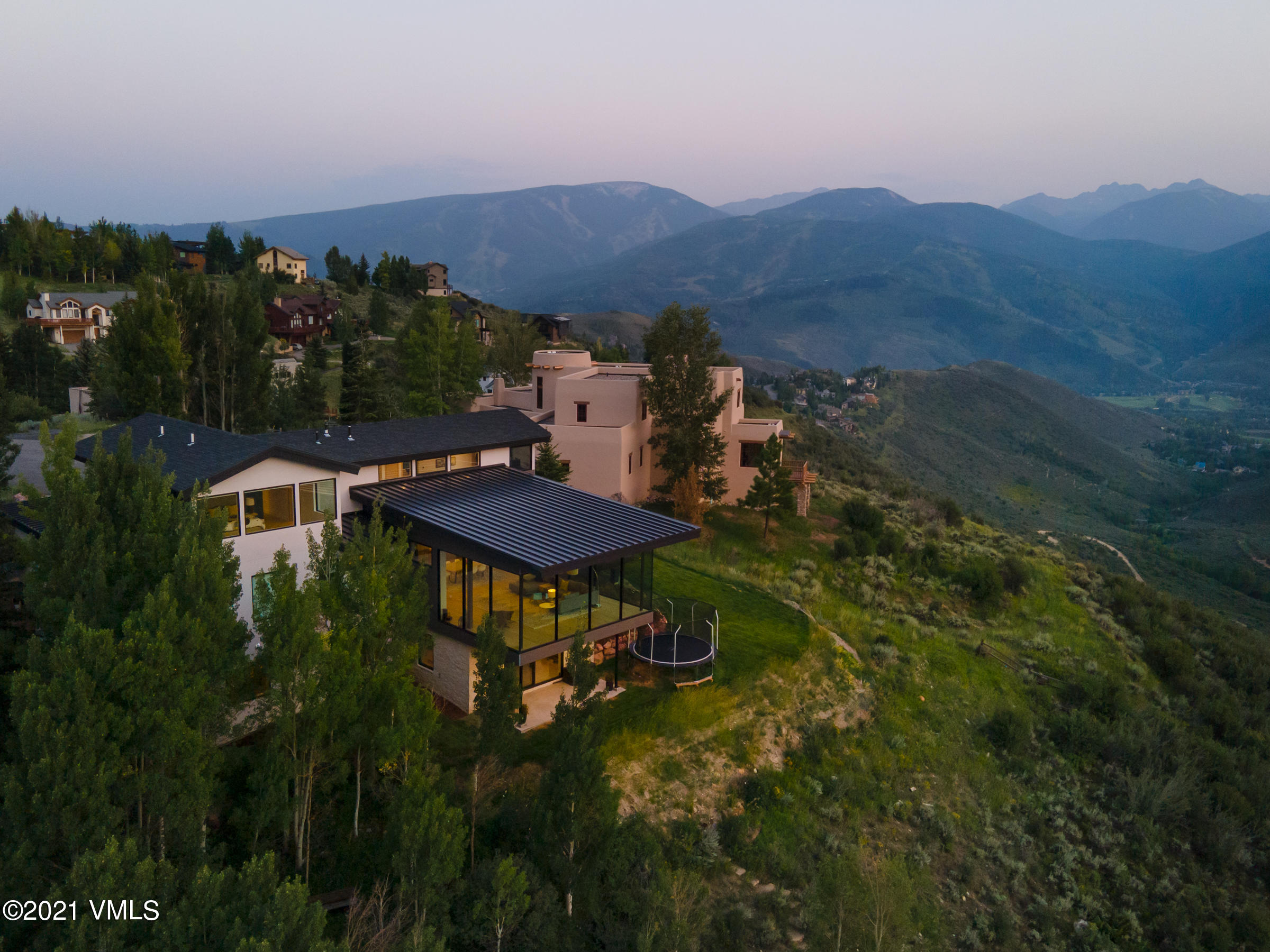 4380 June Point Avon, CO 81620 - Photo 33 of 39 a view of a terrace with a table and chairs