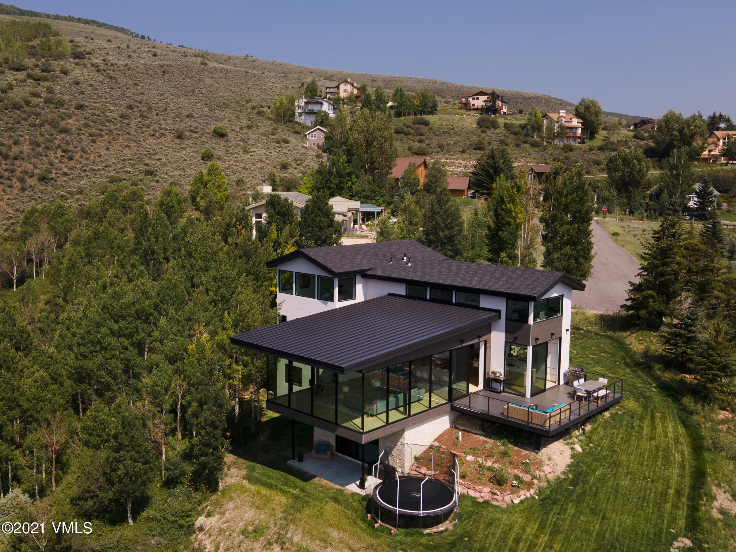 4380 June Point Avon, CO 81620 - Photo 36 of 39 an aerial view of a house with garden space houses with yard