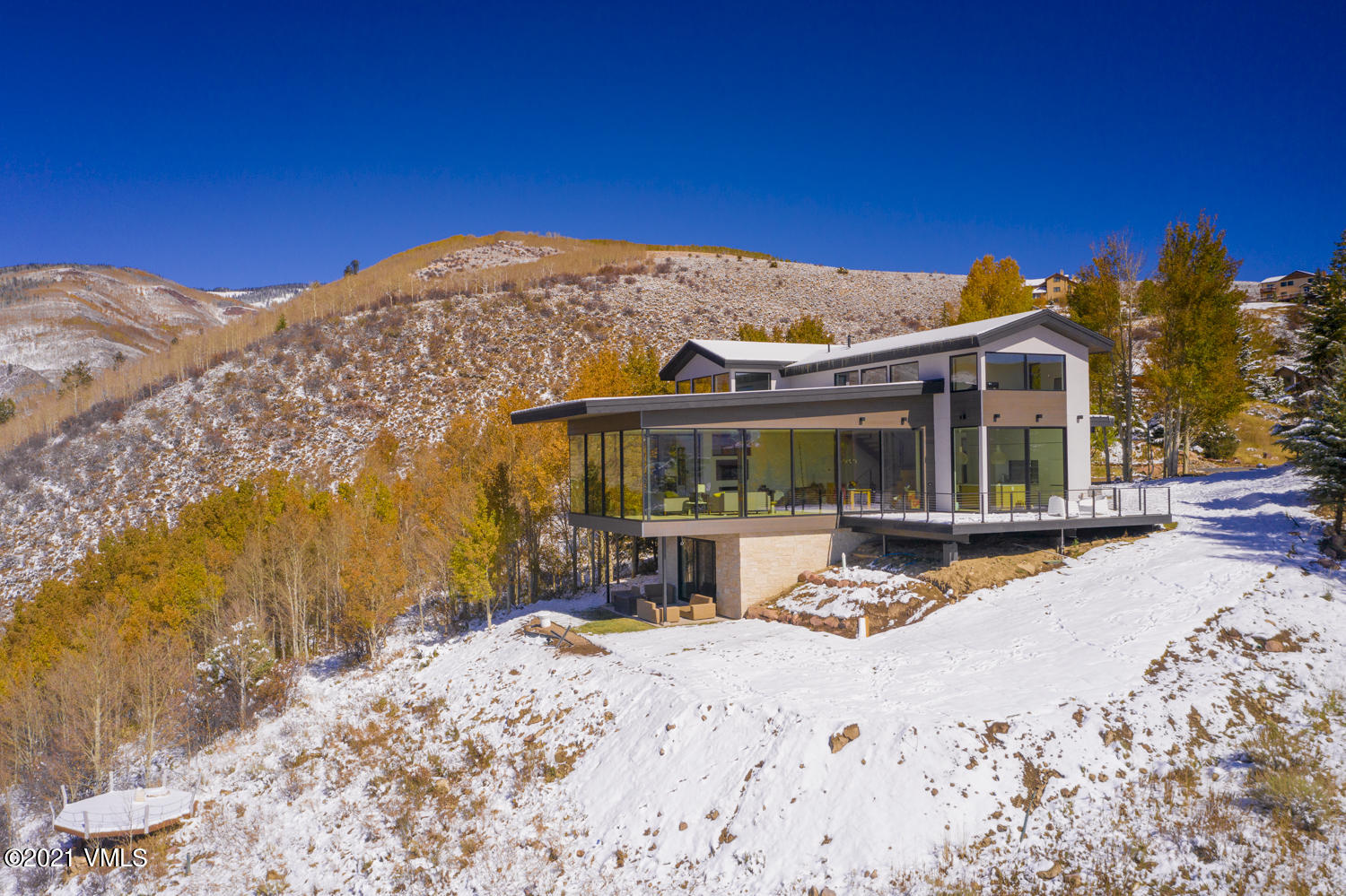 4380 June Point Avon, CO 81620 - Photo 39 of 39 a view of a house with a patio