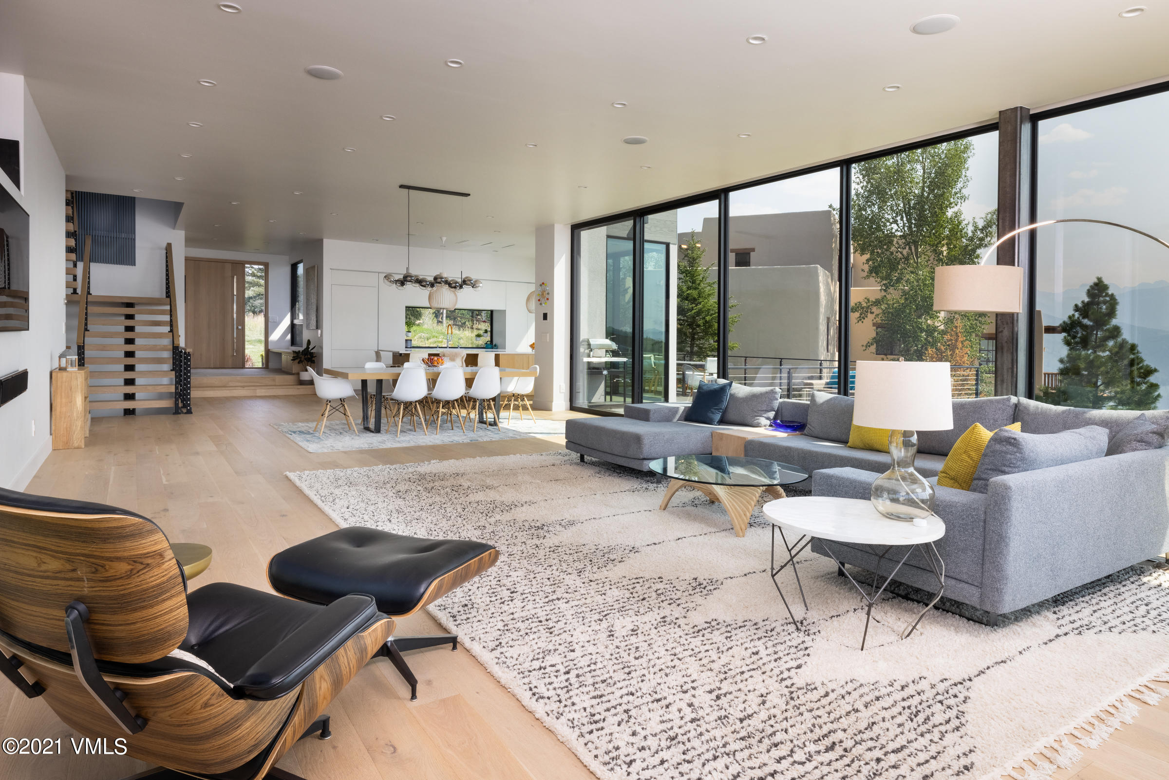 4380 June Point Avon, CO 81620 - Photo 4 of 39 a living room with furniture and a large window