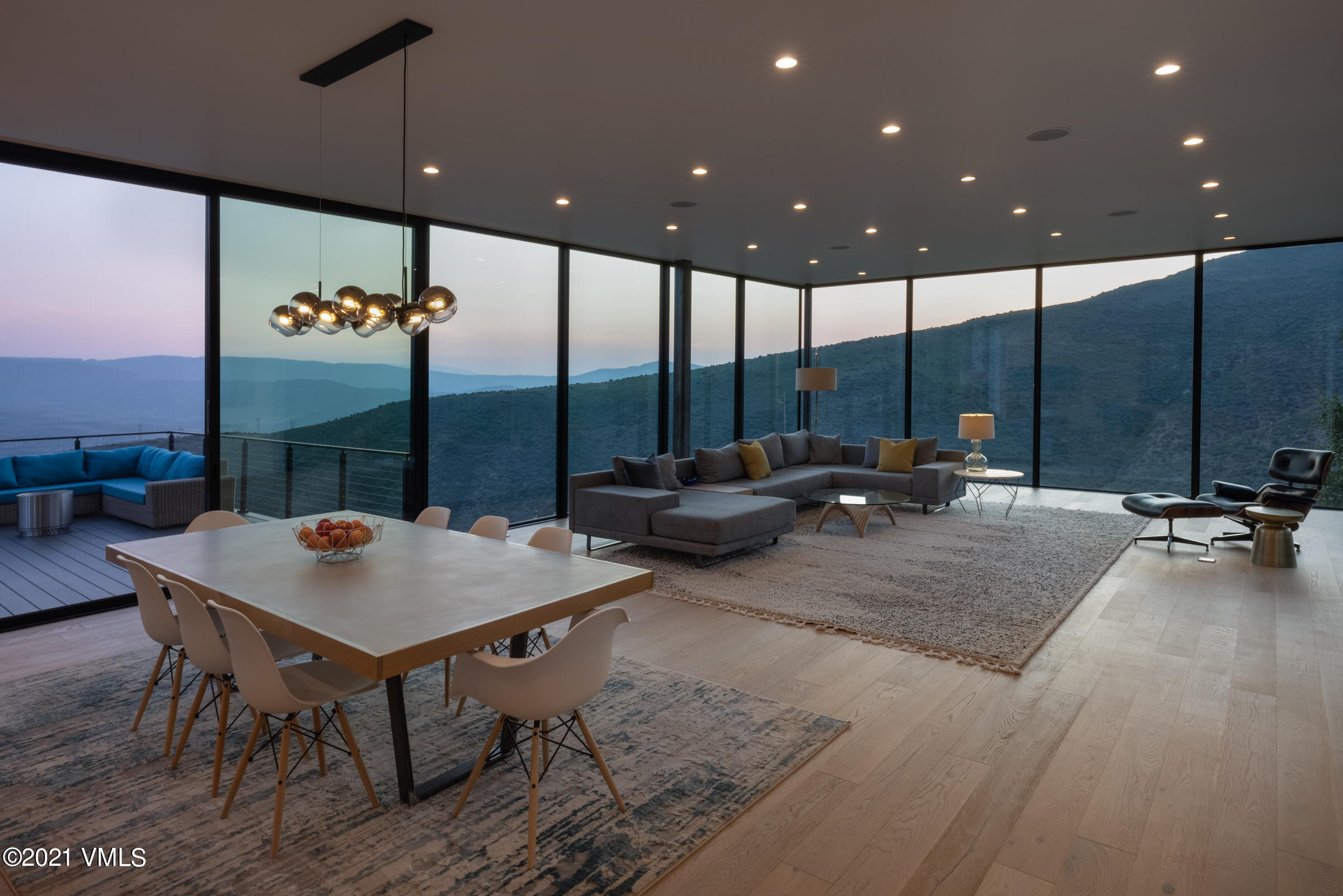 4380 June Point Avon, CO 81620 - Photo 7 of 39 a view of a dining hall with a table and chairs