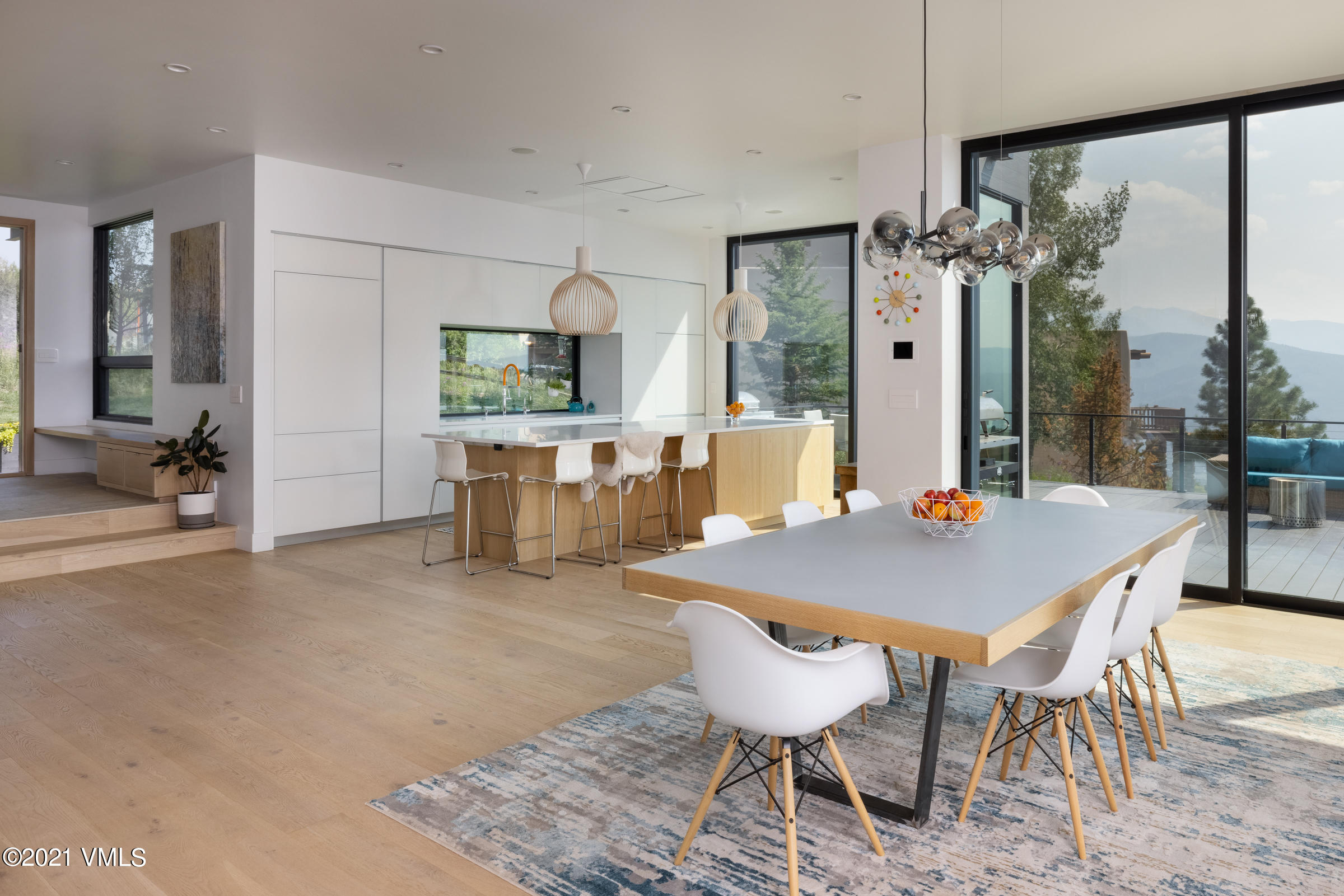4380 June Point Avon, CO 81620 - Photo 10 of 39 a view of a dining room with furniture