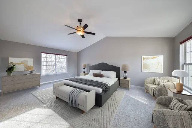 a bedroom with furniture and a window