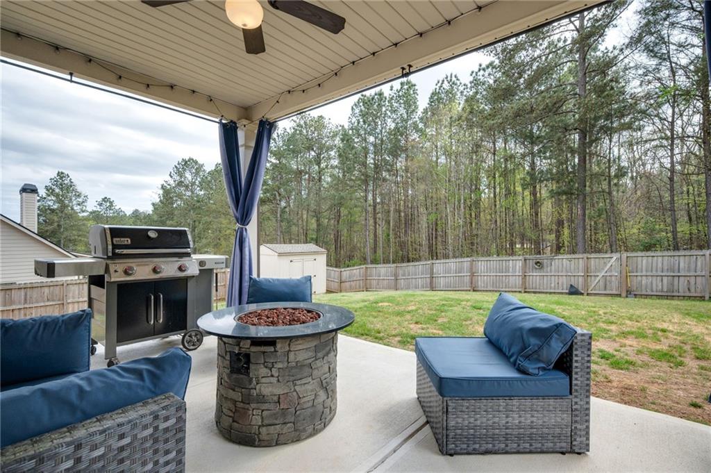 4575 Birch Way Loganville, GA 30052 - Photo 32 of 40 a view of a couches in the patio