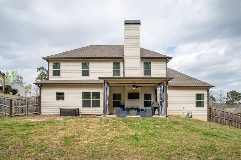4575 Birch Way Loganville, GA 30052 - Photo 33 of 40 a house that has a big yard in front of it