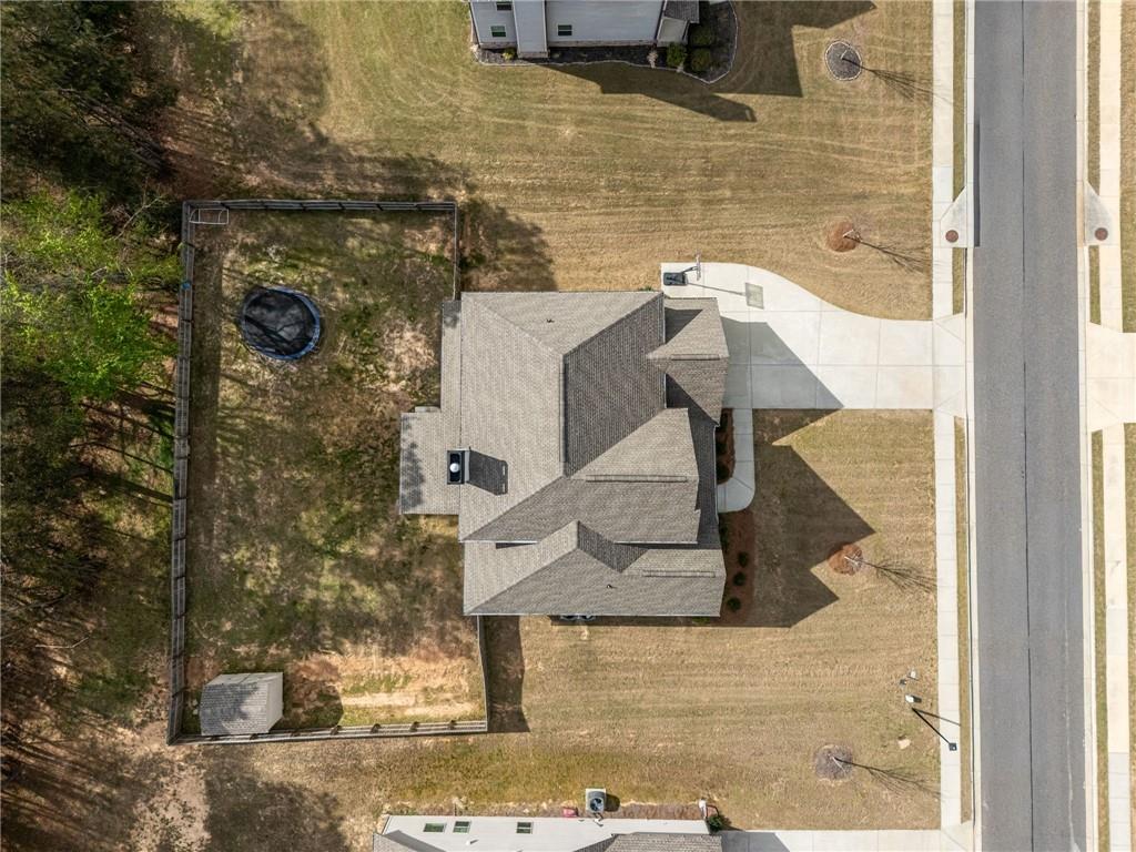 4575 Birch Way Loganville, GA 30052 - Photo 36 of 40 a bathroom with a sink and shower