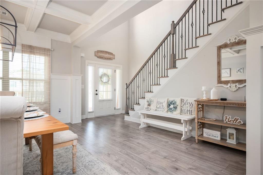 4575 Birch Way Loganville, GA 30052 - Photo 4 of 40 a view of entryway livingroom and hall with wooden floor