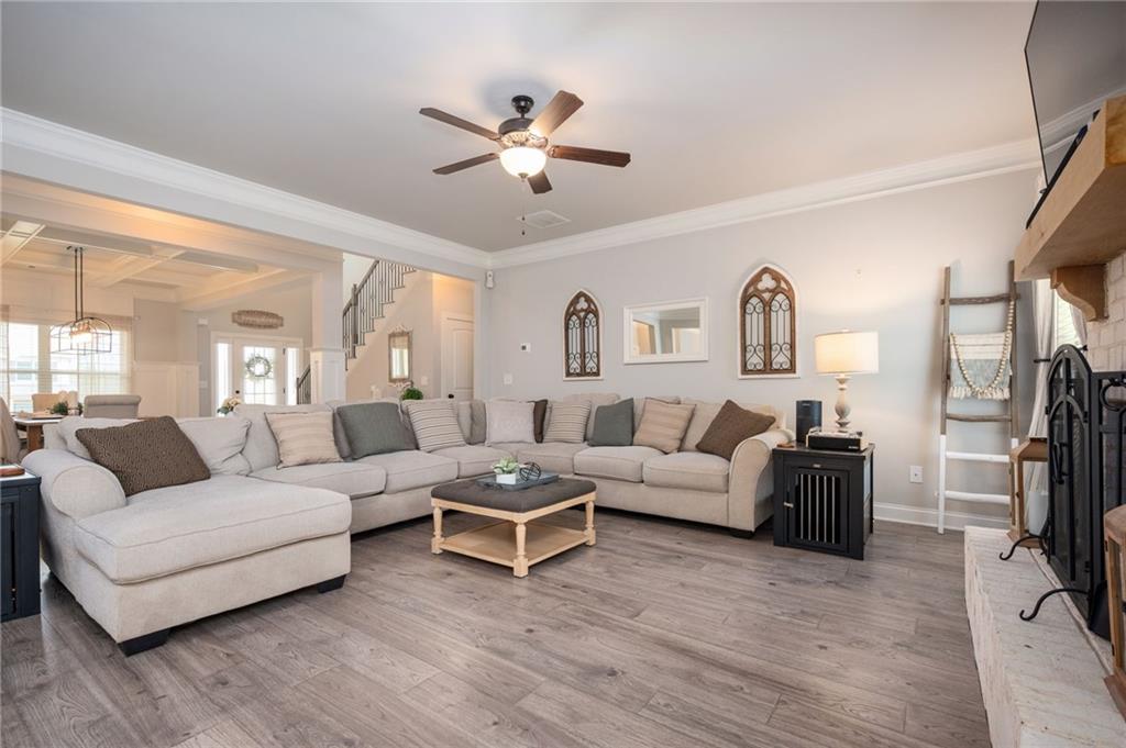 4575 Birch Way Loganville, GA 30052 - Photo 10 of 40 a living room with furniture and a flat screen tv