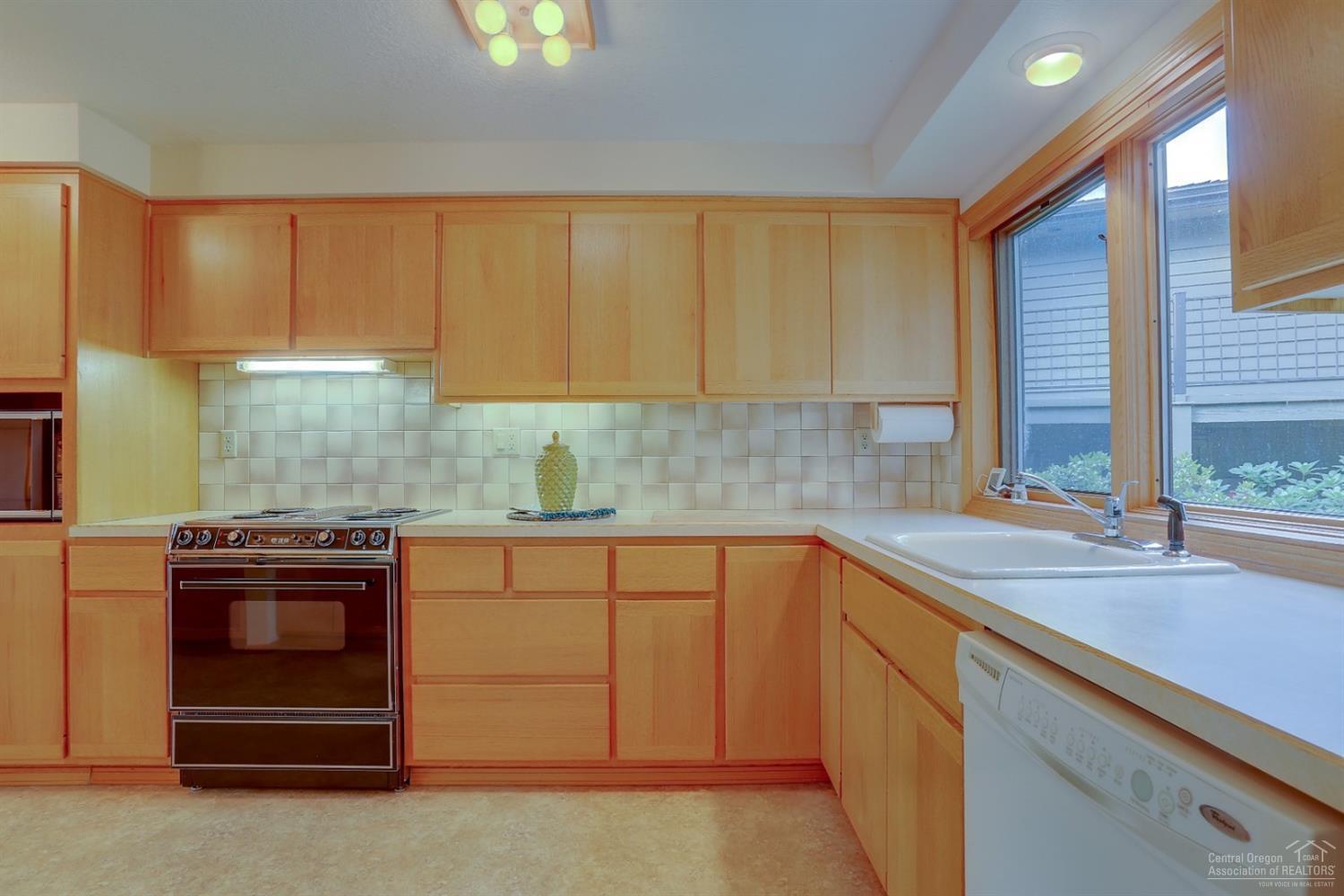1414 Northwest Awbrey Road, Unit 1 Bend, OR 97703 - Photo 9 of 25 2nd view of kitchen. Lots of light from