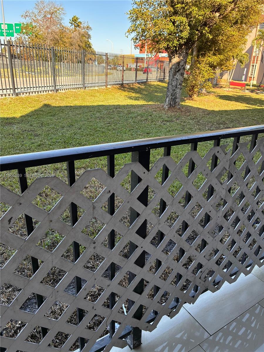 1900 West 68th Street, Unit G103 Hialeah, FL 33014 - Photo 15 of 20 a view of a back yard from a balcony