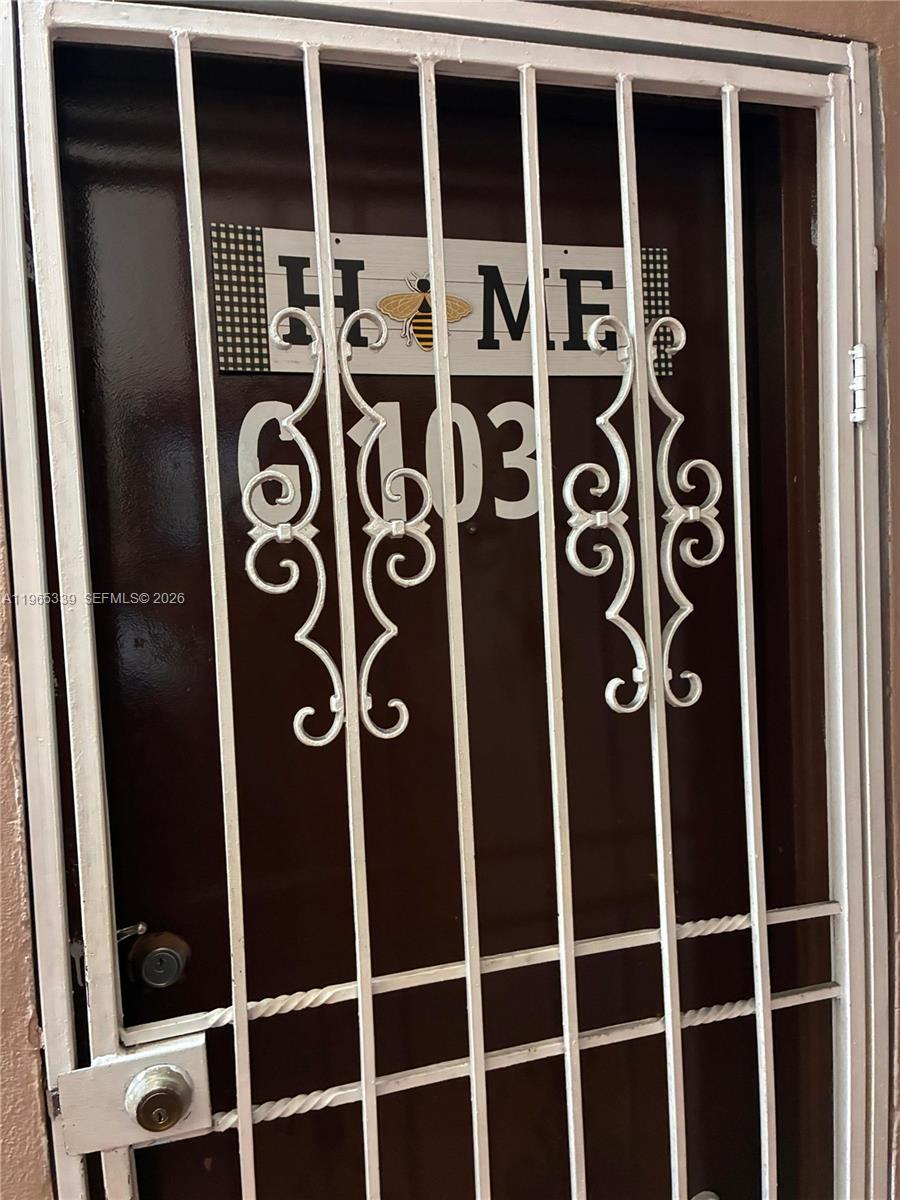 1900 West 68th Street, Unit G103 Hialeah, FL 33014 - Photo 2 of 20 a view of front door