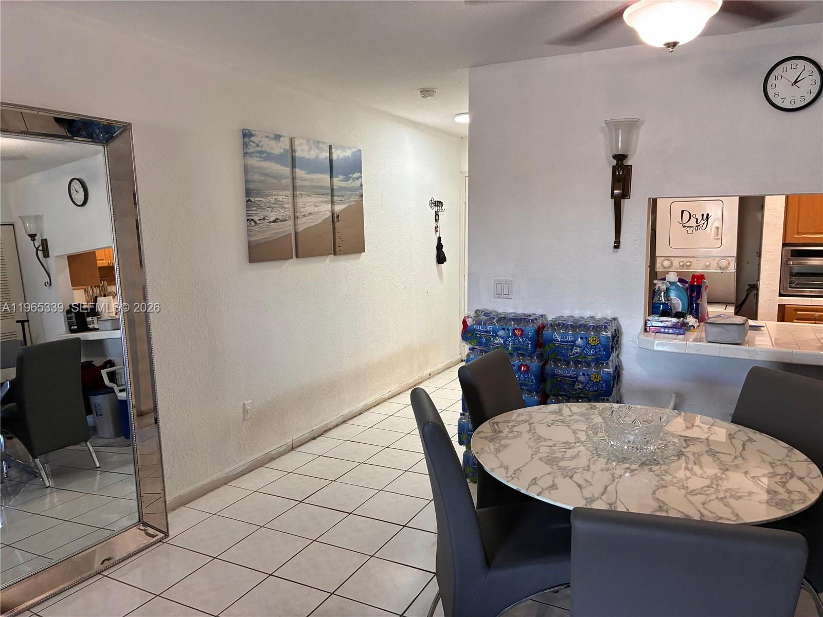 1900 West 68th Street, Unit G103 Hialeah, FL 33014 - Photo 7 of 20 a view of a dining room with furniture