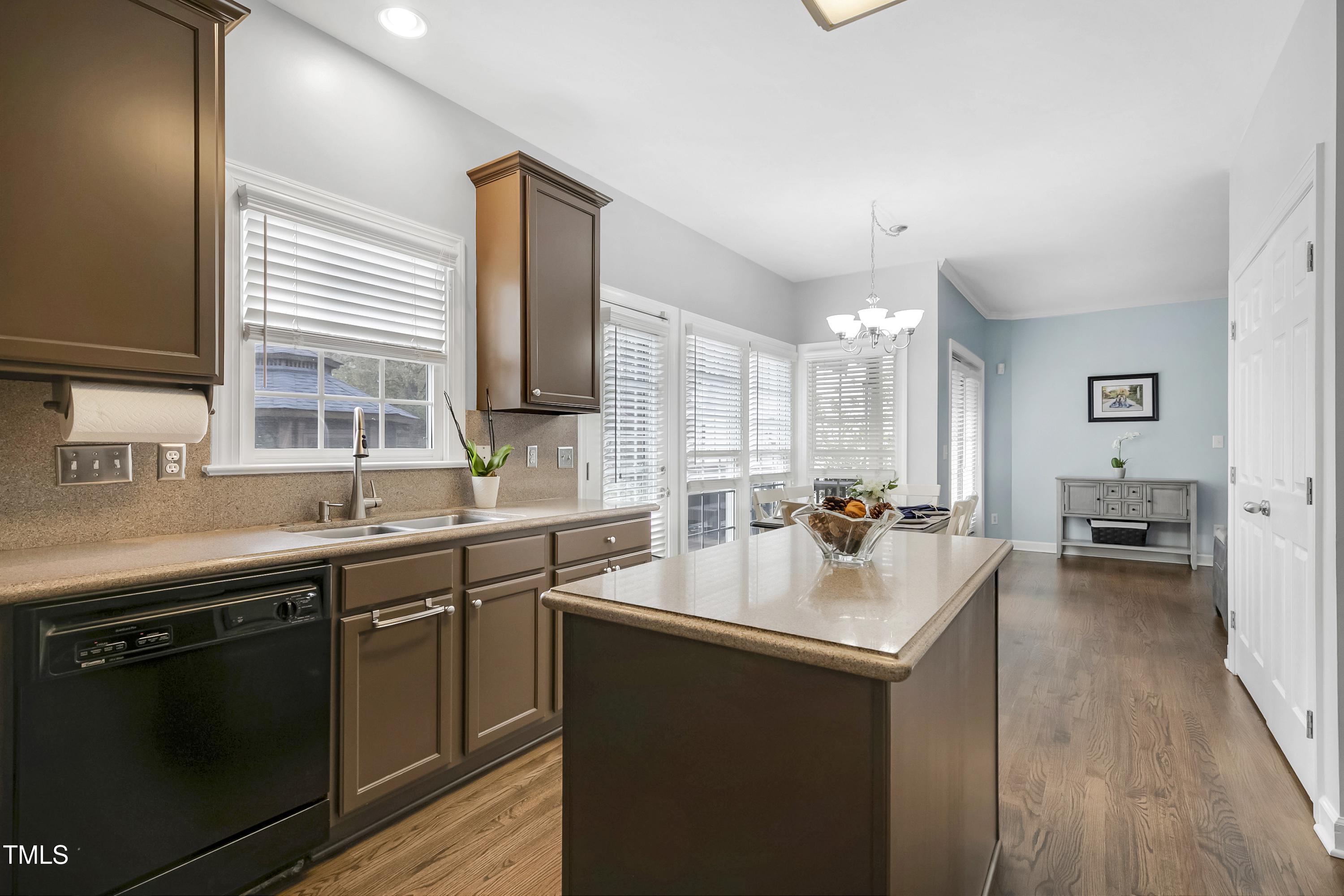 102 Kenneil Court Apex, NC 27502 - Photo 15 of 55 a kitchen with a sink stove and cabinets