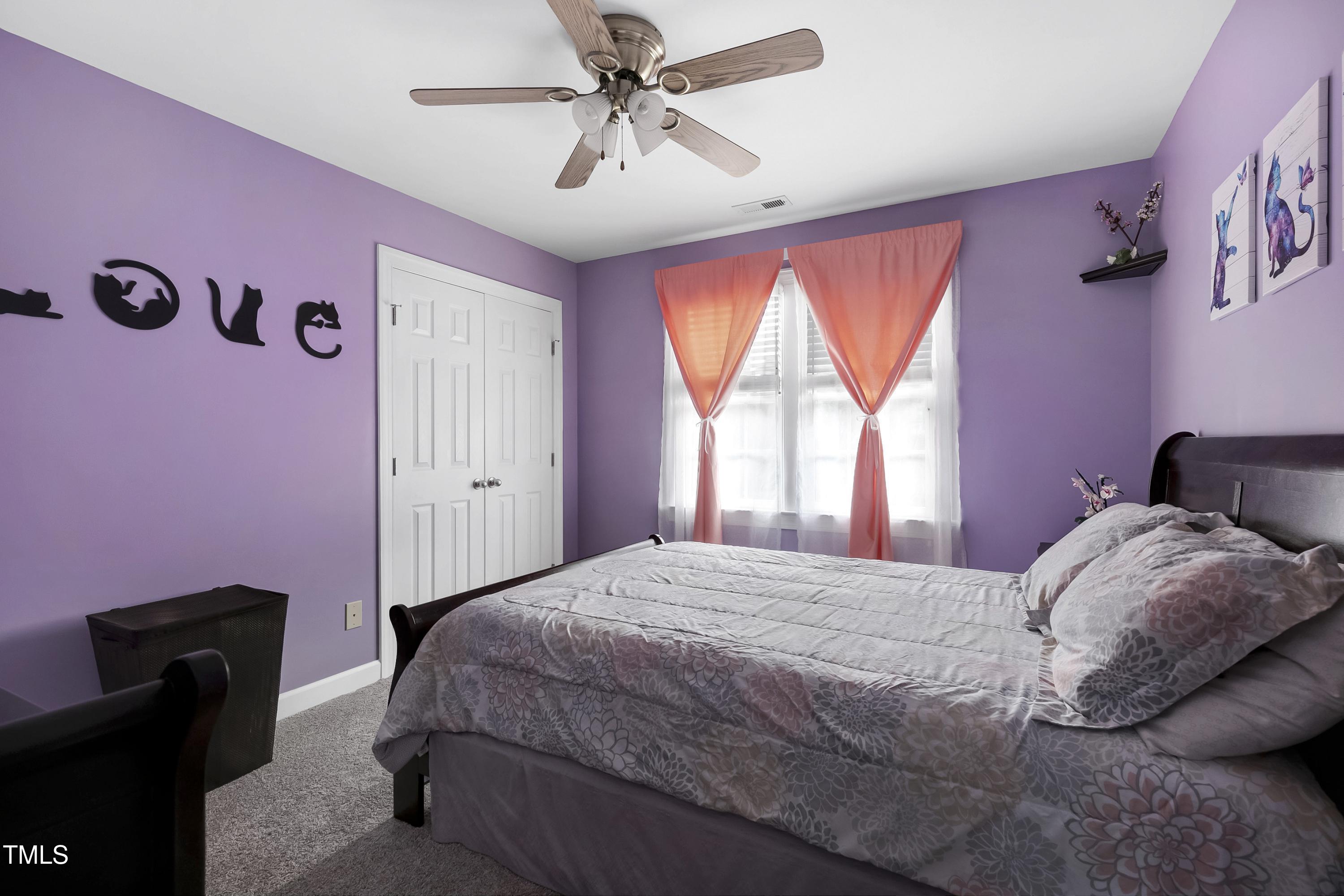 102 Kenneil Court Apex, NC 27502 - Photo 27 of 55 a bedroom with a bed dresser and a window