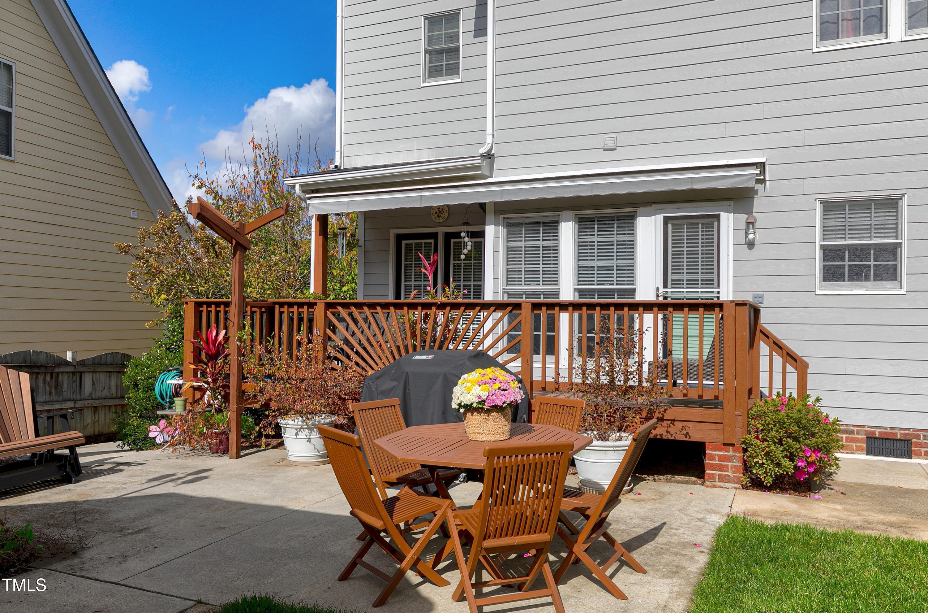 102 Kenneil Court Apex, NC 27502 - Photo 38 of 55 a view of a house with a patio