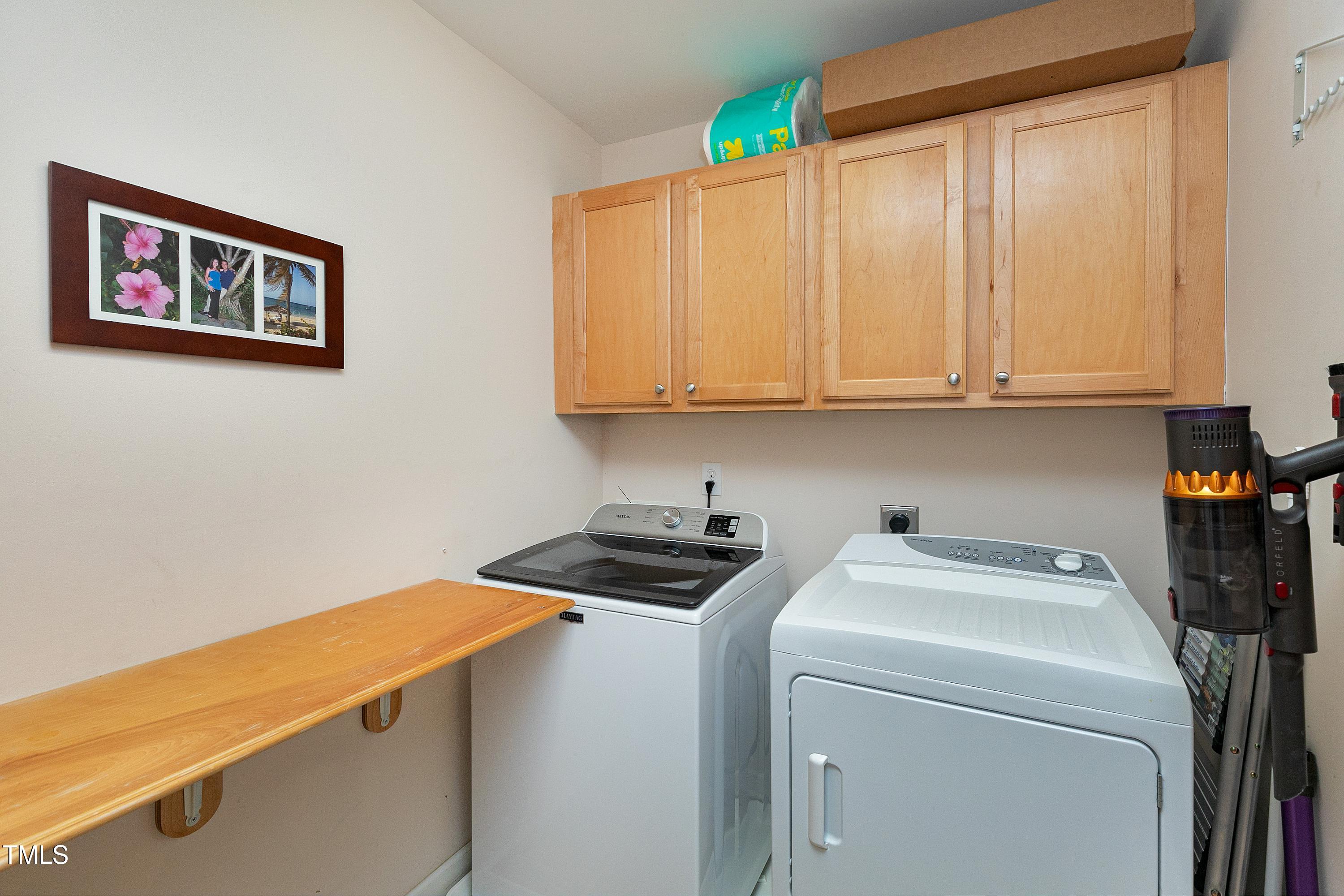 102 Kenneil Court Apex, NC 27502 - Photo 43 of 55 a room with storage and utility