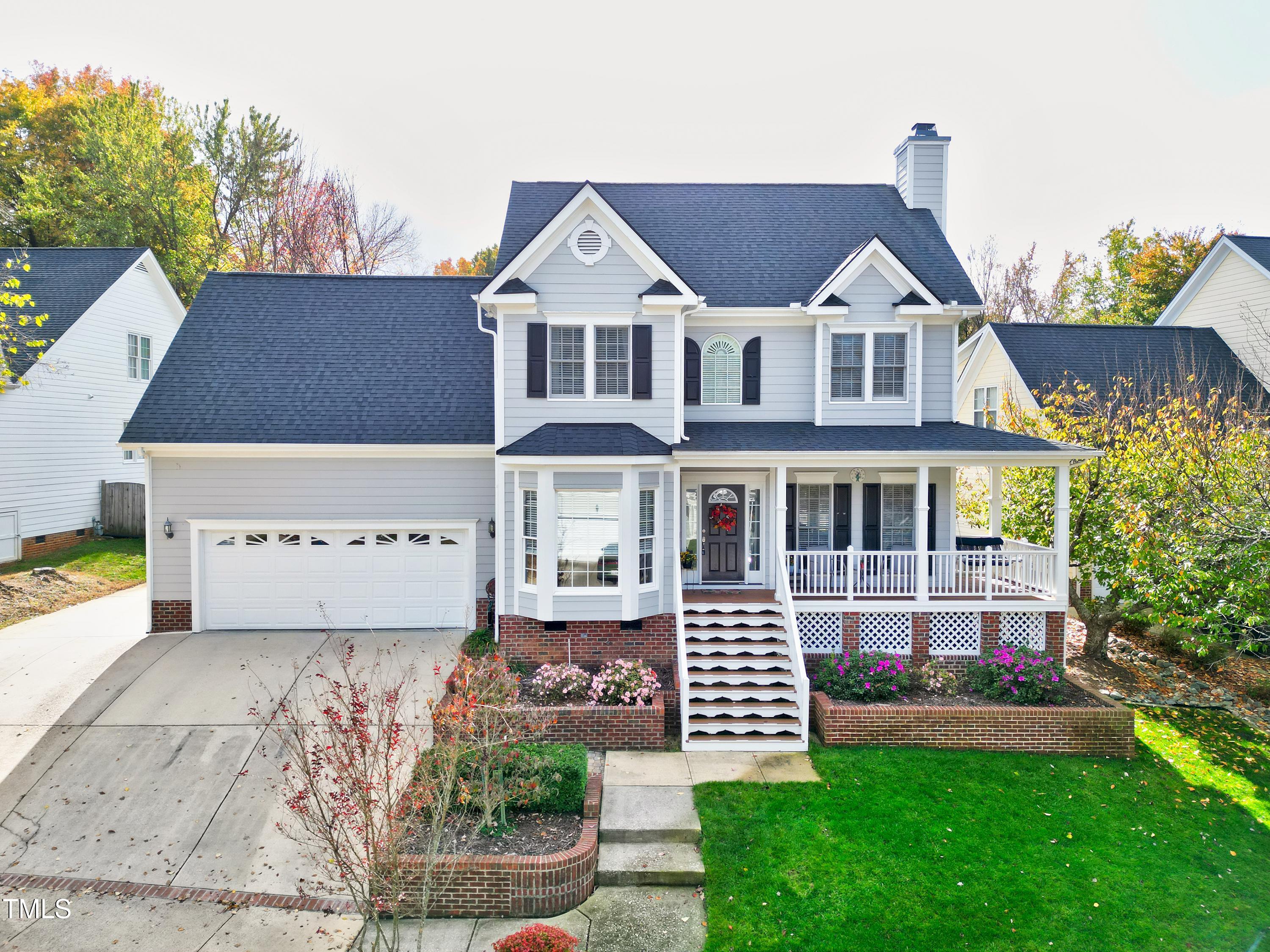 102 Kenneil Court Apex, NC 27502 - Photo 53 of 55 front view of a house with a yard