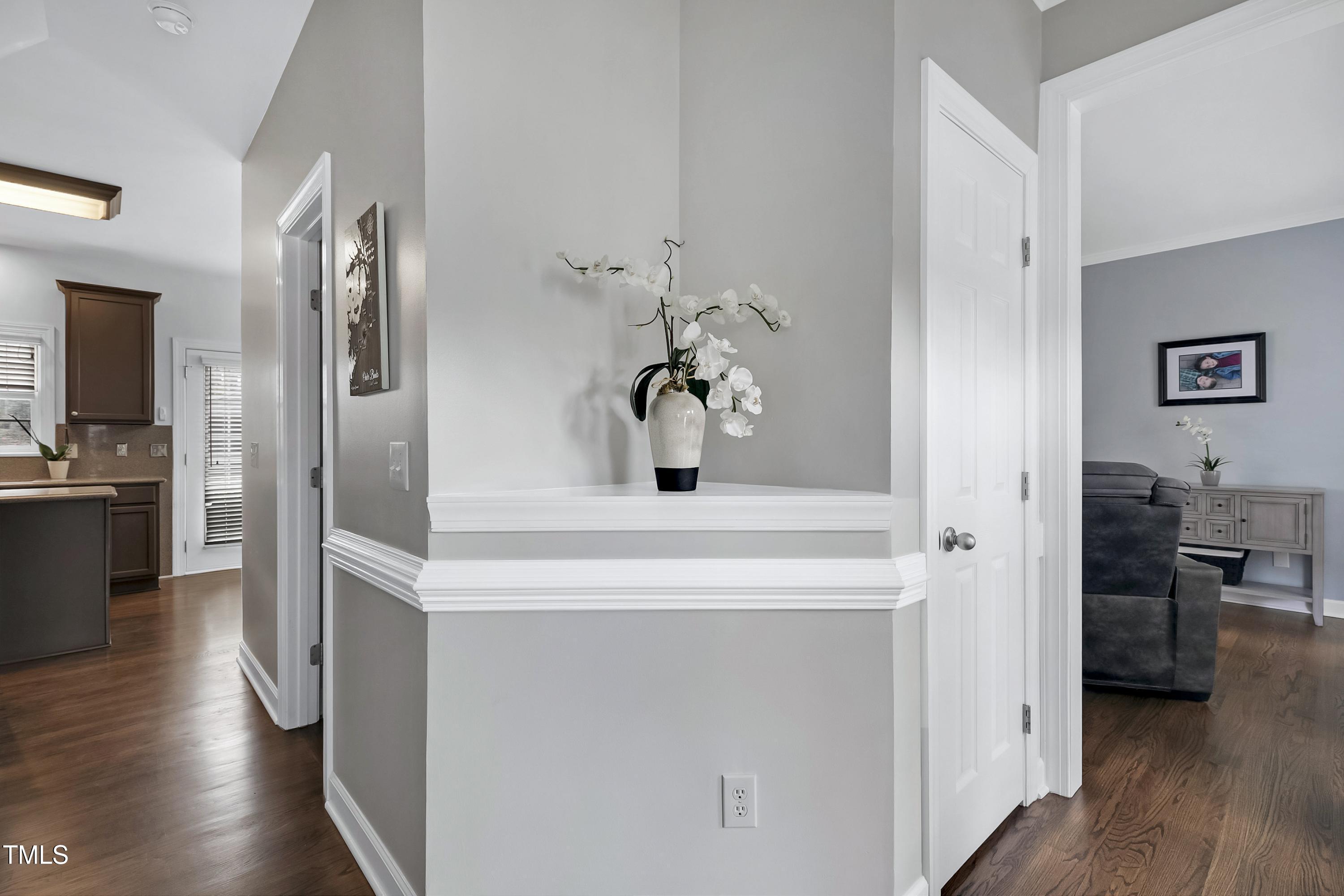 102 Kenneil Court Apex, NC 27502 - Photo 6 of 55 a kitchen with a refrigerator and a stove