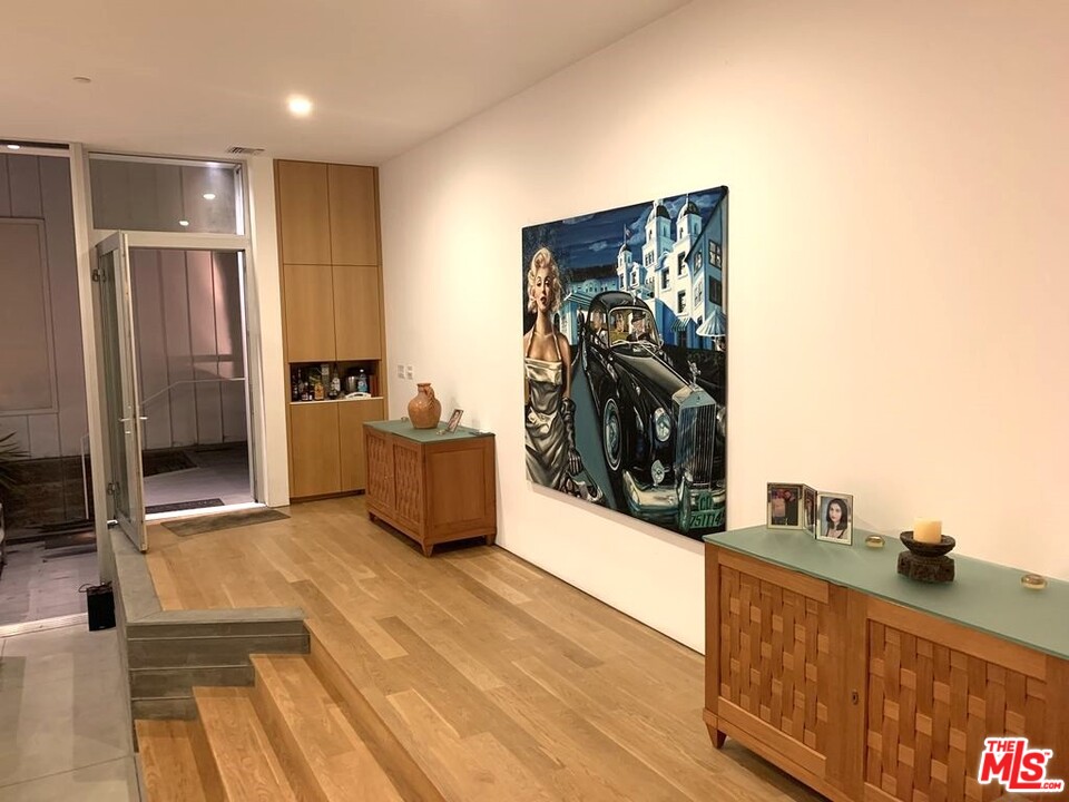 338 Rennie Avenue, Unit 2 Venice, CA 90291 - Photo 2 of 21 a view of a living room and a flat screen tv