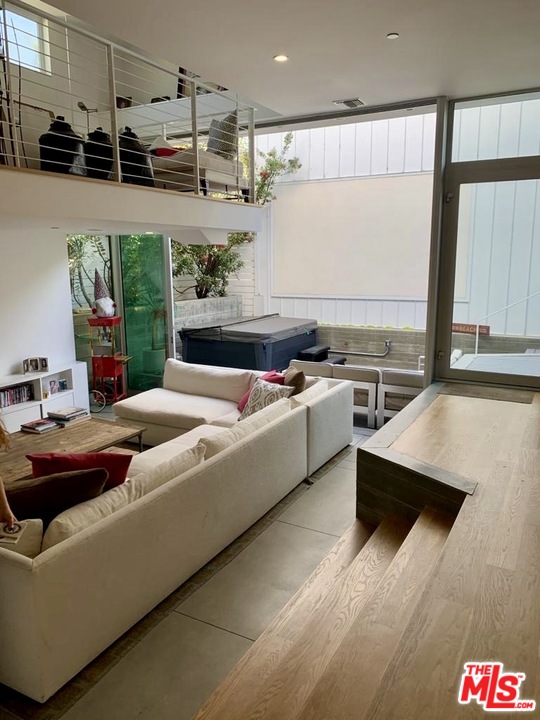 338 Rennie Avenue, Unit 2 Venice, CA 90291 - Photo 7 of 21 a living room with furniture and a table