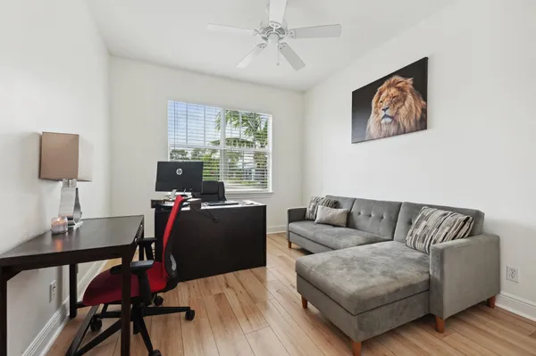 a living room with furniture and a window
