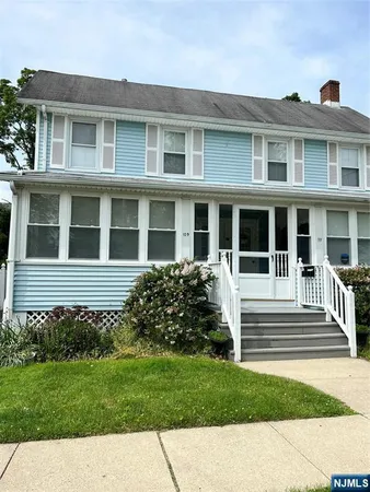 a view of a house with a garden