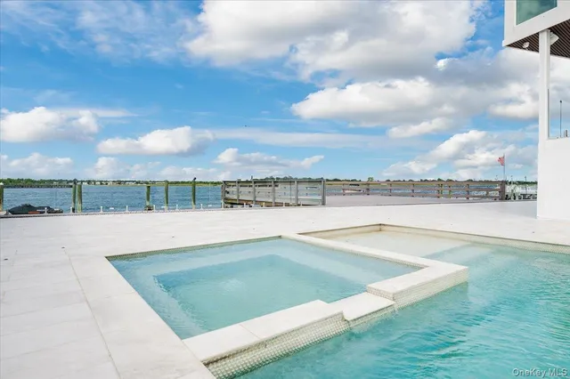a view of a balcony with lake view