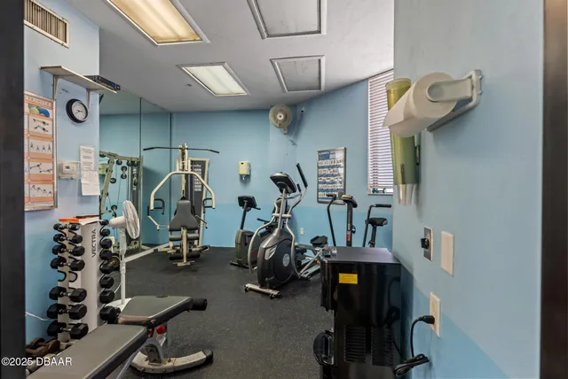 a view of a room with gym equipment
