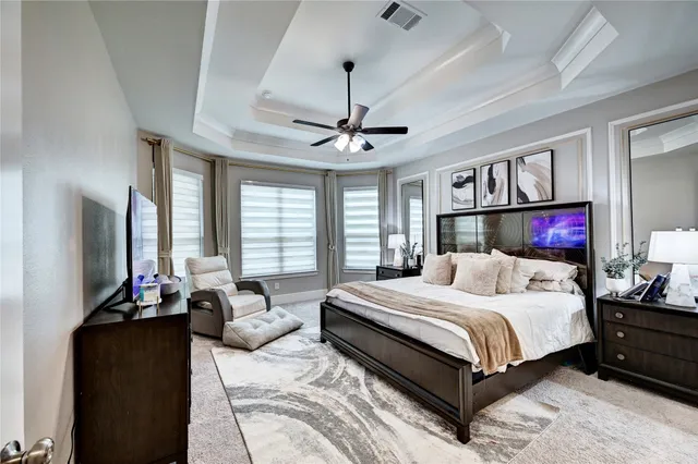a view of a dining room with furniture and window