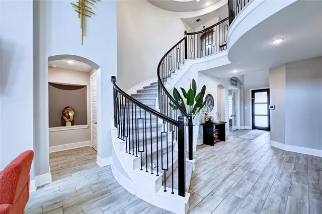 a room with furniture and gym equipment