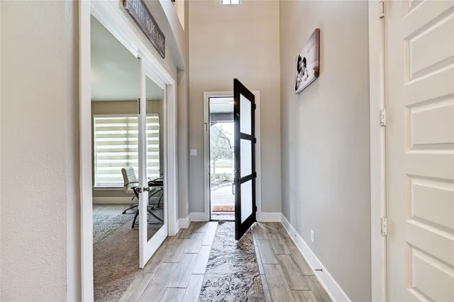 a front view of a house with a glass door