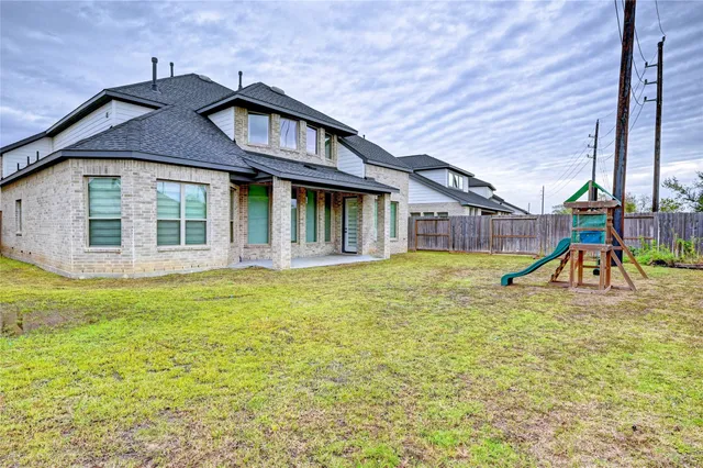 a view of a yard with a slide