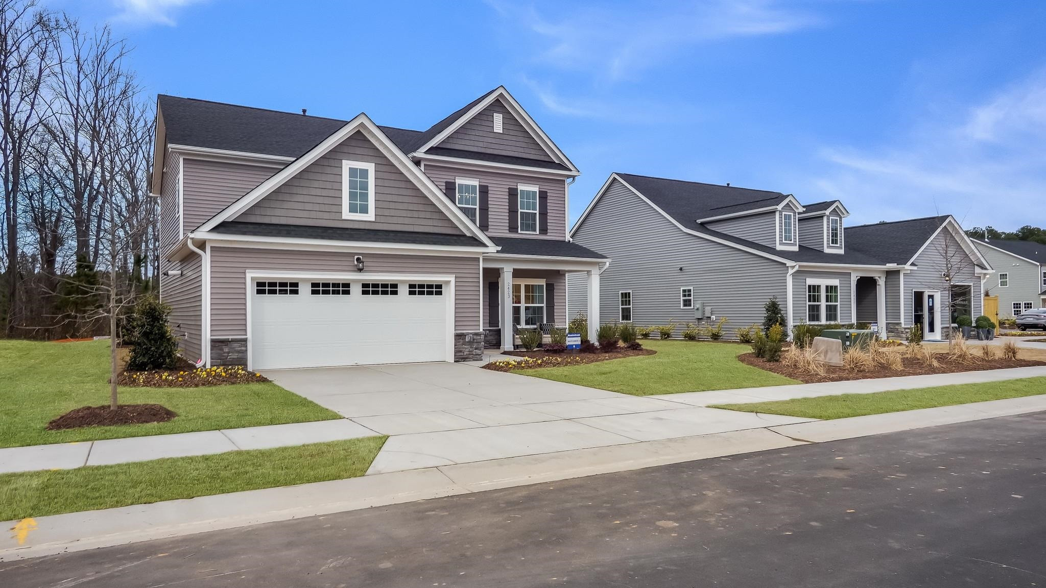 259 Sea Cave Lane, Unit 39 Raleigh, NC 27610 - Photo 4 of 36 front view of a house and a yard