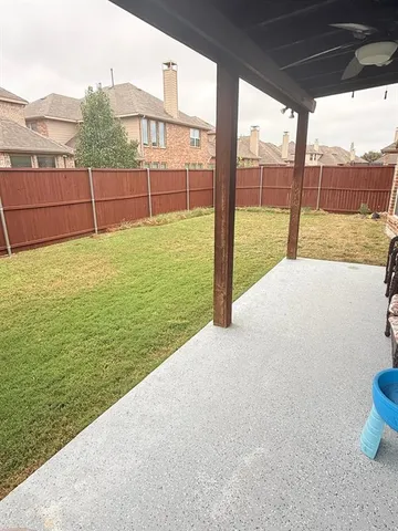 a view of a road with a yard