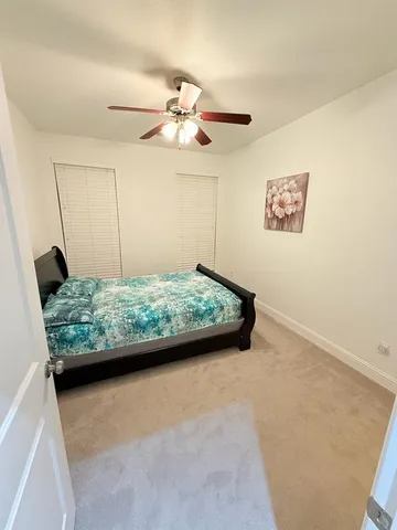 a kitchen with stainless steel appliances a stove and cabinets