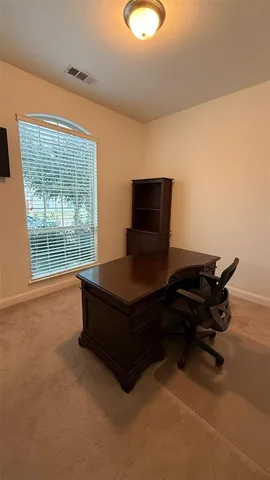 a living room with a large window