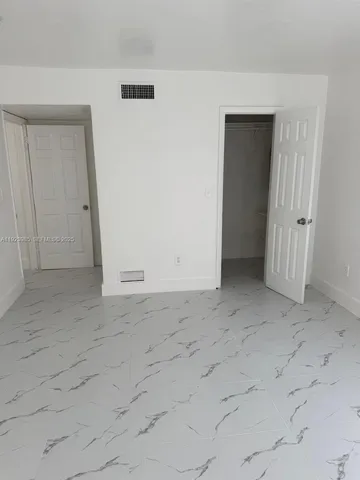 an empty room with a natural light