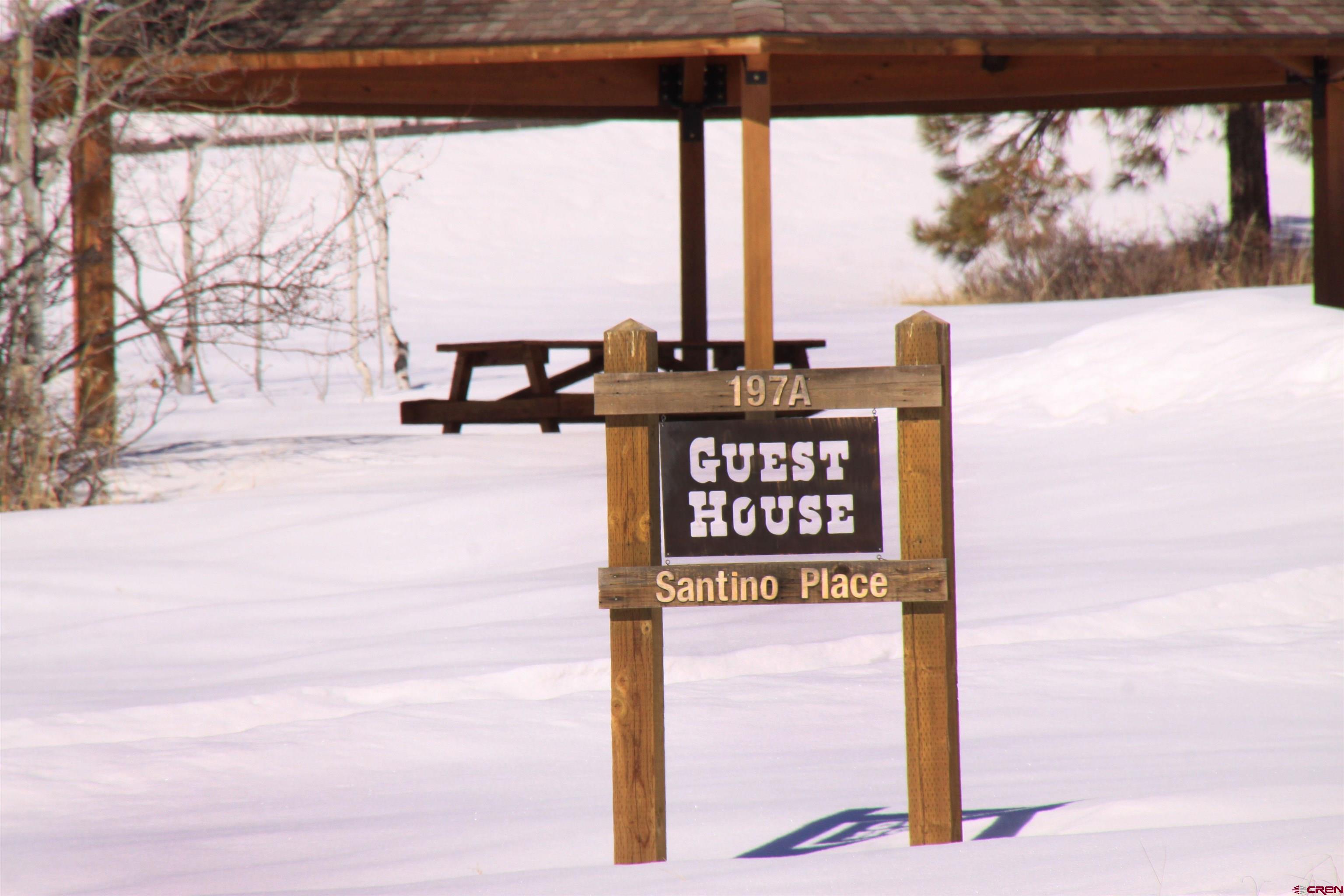 721 Clint Circle Pagosa Springs, CO 81147 - Photo 39 of 42 a picture of a bench in front of building