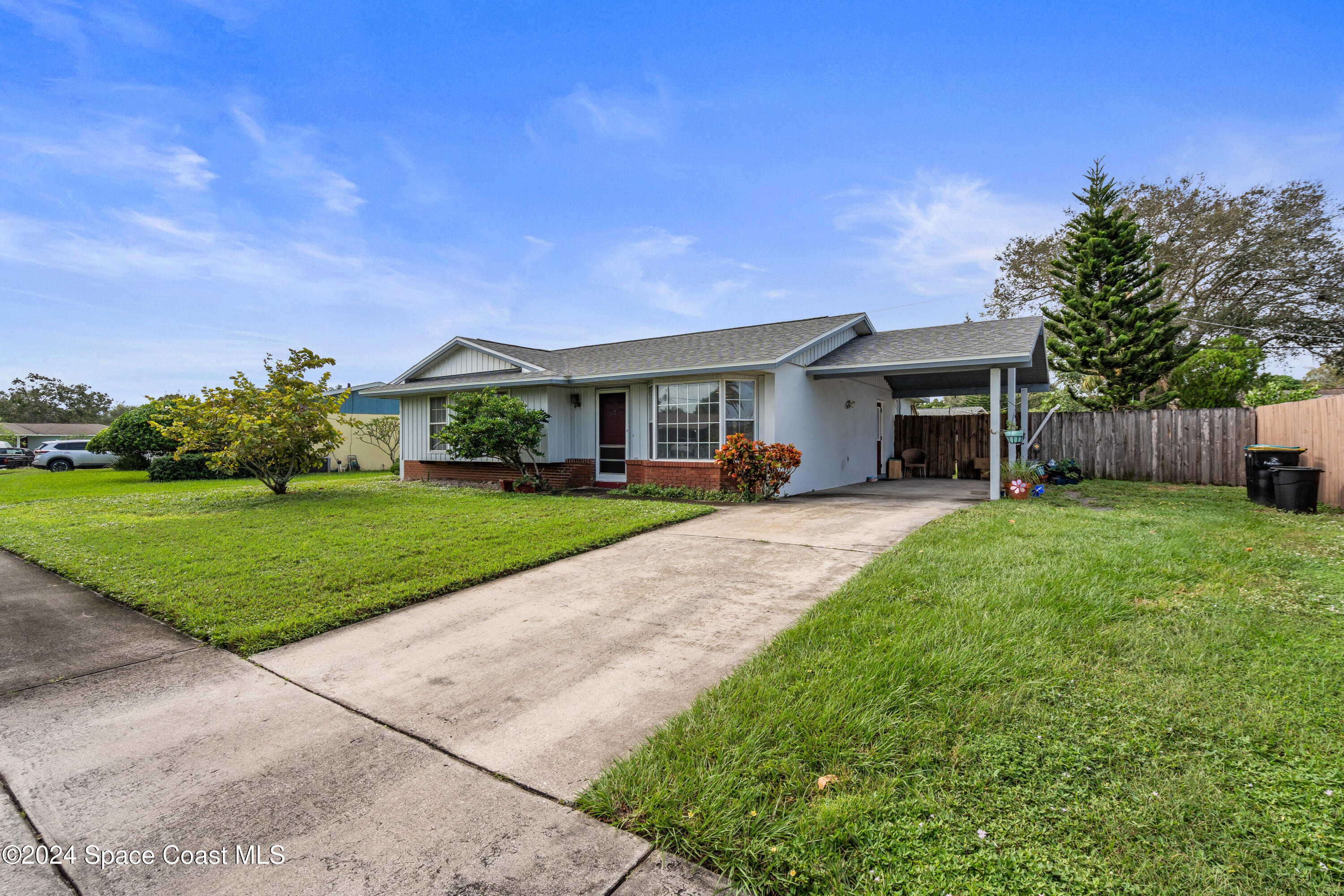 730 Cobblestone Lane Northeast Palm Bay, FL 32905 - Photo 1 of 27 Front of Home
