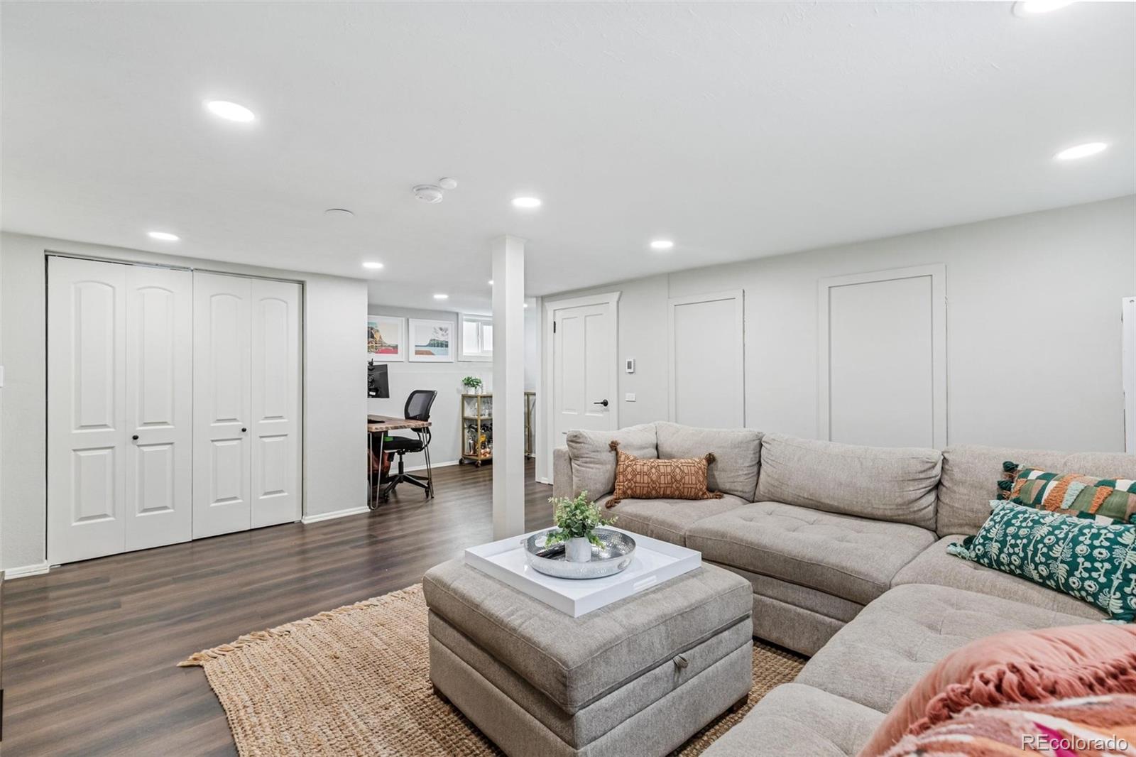 3612 Perry Street Denver, CO 80212 - Photo 24 of 50 a living room with furniture and wooden floor
