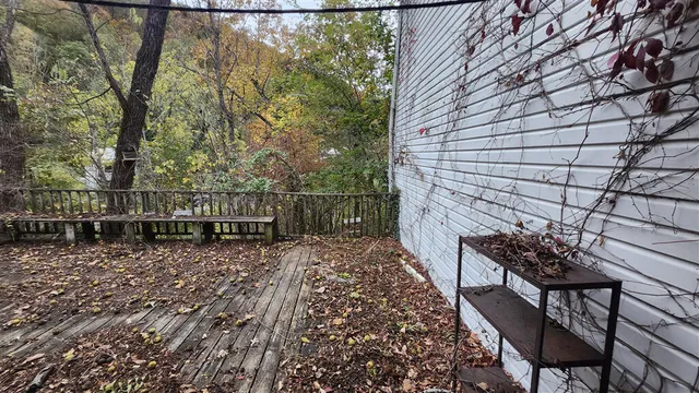 a view of a pathway with a bench
