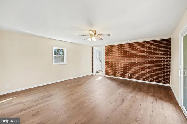 a view of a kitchen with a sink and dishwasher