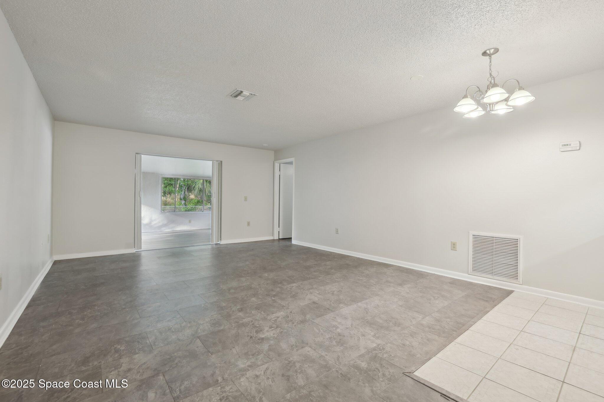 3837 Parapet Drive Cocoa, FL 32926 - Photo 31 of 42 an empty room with a view of a bathroom