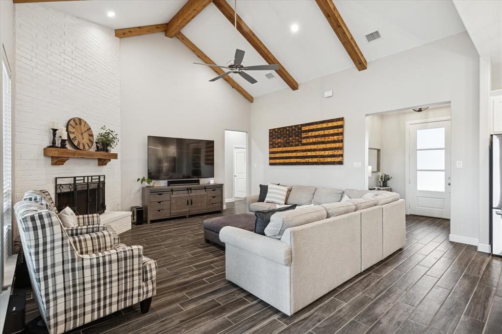 112 Friendship Way Boyd, TX 76023 - Photo 6 of 29 Vaulted ceiling with exposed wood beams