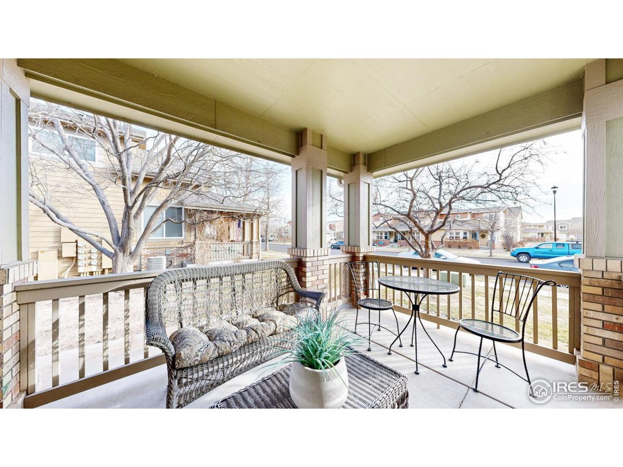 2621 Rigden Parkway, Unit 4 Fort Collins, CO 80525 - Photo 24 of 28 a living room with furniture and a large window